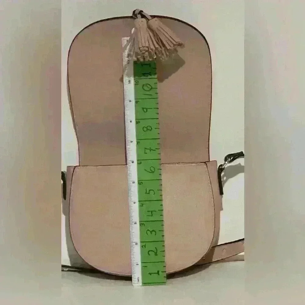 A Victoria’s Secret light pink crossbody bag w/ tassels. - Picture 8 of 9